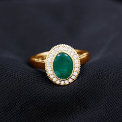 6X8 mm Oval Lab Grown Emerald Bezel Set Engagement Ring With Diamond Halo