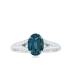 6x8mm Oval Cut London Blue Topaz Solitaire Engagement Ring with Diamond Split Shank