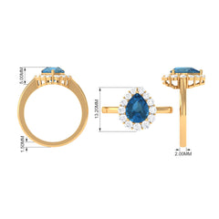 7x10mm Pear Shape London Blue Topaz Halo Engagement Ring with Diamond