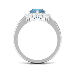 7x10mm Pear Shape London Blue Topaz Halo Engagement Ring with Diamond