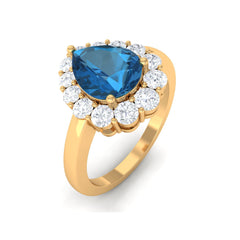 7x10mm Pear Shape London Blue Topaz Halo Engagement Ring with Diamond