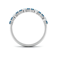 Baguette London Blue Topaz Uneven Eternity Ring with Moissanite