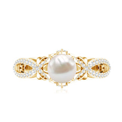 Freshwater Pearl and Diamond Crossover Engagement Ring