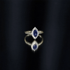 Marquise Cut Lab Grown Blue Sapphire and Diamond Halo Engagement Ring