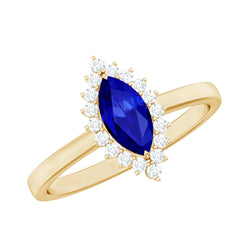 Marquise Cut Lab Grown Blue Sapphire and Diamond Halo Engagement Ring