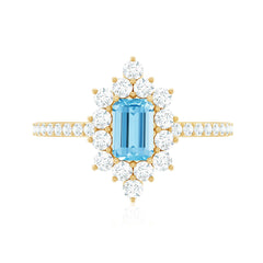 Vintage Aquamarine and Diamond Halo Engagement Ring