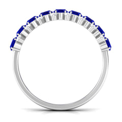 Oval Cut Blue Sapphire and Diamond Half Eternity Ring