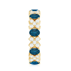 Oval Cut London Blue Topaz Designer Eternity Band with Diamond