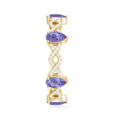 Natural Pear Shape Tanzanite Diamond Eternity Ring with Crossover Shank