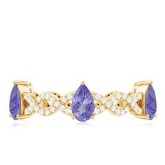 Natural Pear Shape Tanzanite Diamond Eternity Ring with Crossover Shank