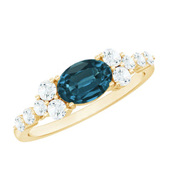 6X8mm Oval Cut London Blue Topaz Promise Ring with Diamond