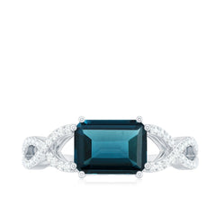 6X8mm Emerald Cut London Blue Topaz East West Engagement Ring with Diamond
