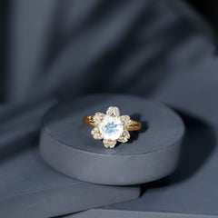 0.85 CT Moonstone and Diamond Floral Halo Engagement Ring
