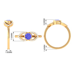 Bezel Set Tanzanite Solitaire Split Shank Ring with Diamond