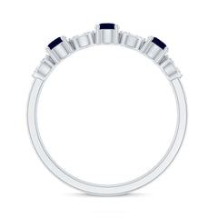 Blue Sapphire and Diamond Semi Eternity Ring