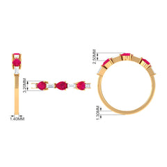 East West Style Pear Shape Ruby Half Eternity Ring with Baguette Diamond
