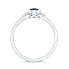 London Blue Topaz Bezel Engagement Ring with Diamond Halo