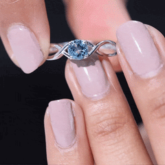Solitaire Aquamarine Infinity Promise Ring
