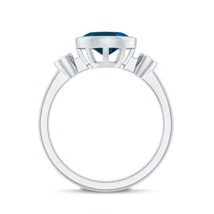 Oval London Blue Topaz Bezel Set Engagement Ring with Diamond