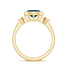 Oval London Blue Topaz Bezel Set Engagement Ring with Diamond