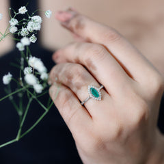 Elongated Marquise Cut Emerald Engagement Ring with Diamond Halo