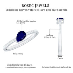 Pear Cut Blue Sapphire Solitaire Ring with Diamond Side Stones