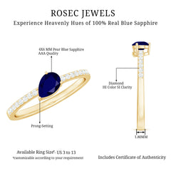 Pear Cut Blue Sapphire Solitaire Ring with Diamond Side Stones