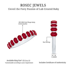 Oval Cut Created Ruby Half Eternity Ring in Bar Setting