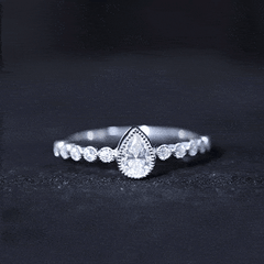Lab Grown Diamond 5X7 MM Pear Shaped Engagement Ring With Side Stones