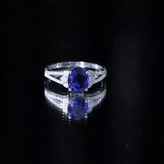 Certified 4 Carat Lab Grown Blue Sapphire Oval Engagement Ring with Moissanite Split Shank