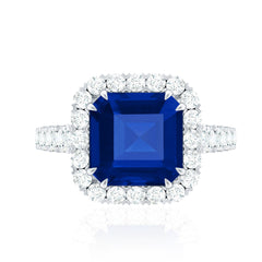 Certified 6.75 Carat Asscher Cut Lab Grown Blue Sapphire Engagement Ring with Diamond Halo
