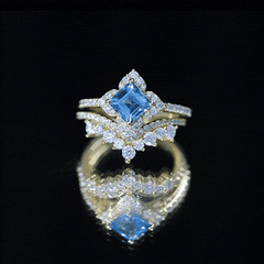 Genuine Princess Cut Swiss Blue Topaz Floral Wedding Ring Set in Silver