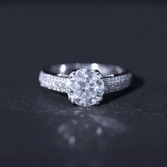 Round Moissanite Engagement Ring with Pave Set Side Stones