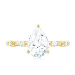 Pear Shaped Moissanite Engagement Ring with Spaced Accent