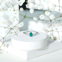 Pear Shaped Emerald Engagement Ring with Diamond Side Stones