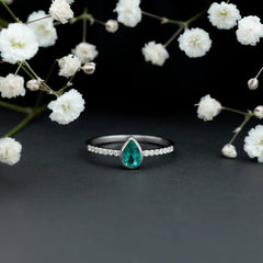 Pear Shaped Emerald Engagement Ring with Diamond Side Stones