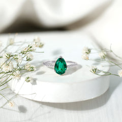 Lab Created Emerald 7X10 mm Pear Shape Engagement Ring With Hidden Moissanite