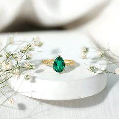 Lab Created Emerald 7X10 mm Pear Shape Engagement Ring With Hidden Moissanite