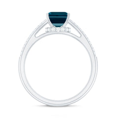 6X8mm Emerald Cut London Blue Topaz Side Stone Engagement Ring with Diamond