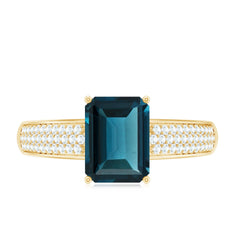 6X8mm Emerald Cut London Blue Topaz Side Stone Engagement Ring with Diamond