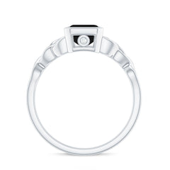 Emerald Cut Black Onyx Bezel Set Engagement Ring with Surprise Diamond