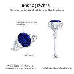Certified 4 Carat Oval Lab Grown Blue Sapphire Bezel Set Engagement Ring