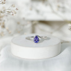 Natural Tanzanite Solitaire Engagement Ring with Bypass Shank