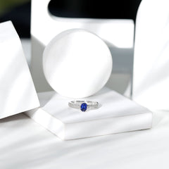 Certified 0.6 Carat Oval Lab Grown Blue Sapphire Engagement Ring with Diamond
