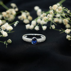 Certified 0.6 Carat Oval Lab Grown Blue Sapphire Engagement Ring with Diamond