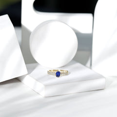 Certified 0.6 Carat Oval Lab Grown Blue Sapphire Engagement Ring with Diamond