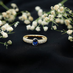 Certified 0.6 Carat Oval Lab Grown Blue Sapphire Engagement Ring with Diamond