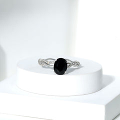 Oval Shaped 7X9MM Black Onyx and Diamond Braided Engagement Ring
