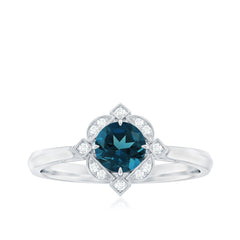 Round Cut London Blue Topaz and Diamond Flower Engagement Ring