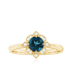 Round Cut London Blue Topaz and Diamond Flower Engagement Ring
